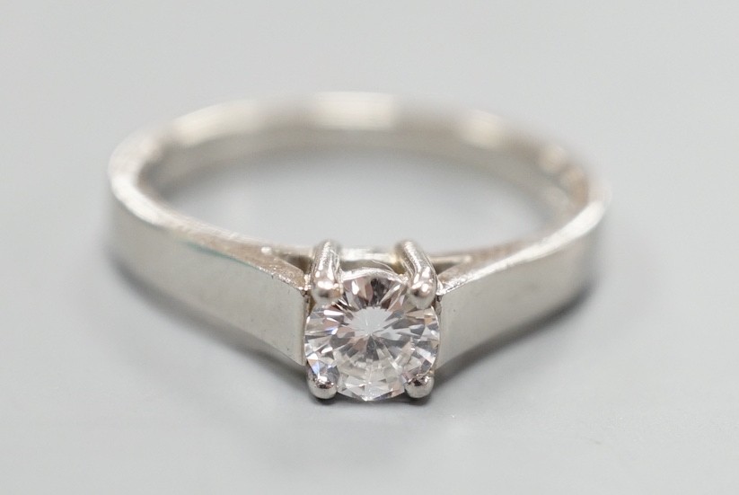 A modern platinum and solitaire diamond ring, size M, gross weight 5.2 grams
